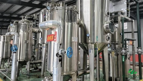 Fruit drying and milling equipment in a food-grade workshop