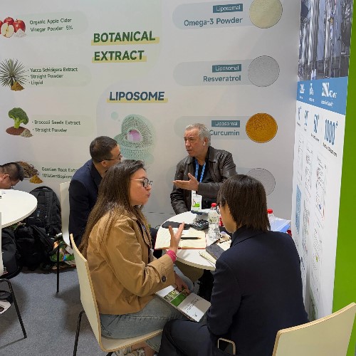 Mr. Liu discusses nutraceutical solutions with a European buyer Mr. Liu discusses nutraceutical solutions with a European buyer